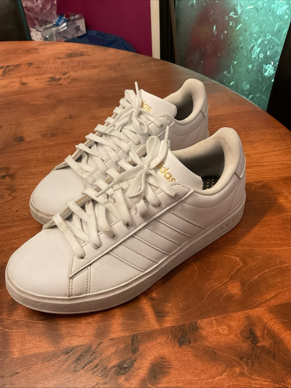 adidas White Low-Top Leather Sneakers with Gold Logo